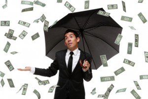 Business man looking satisfied raining money